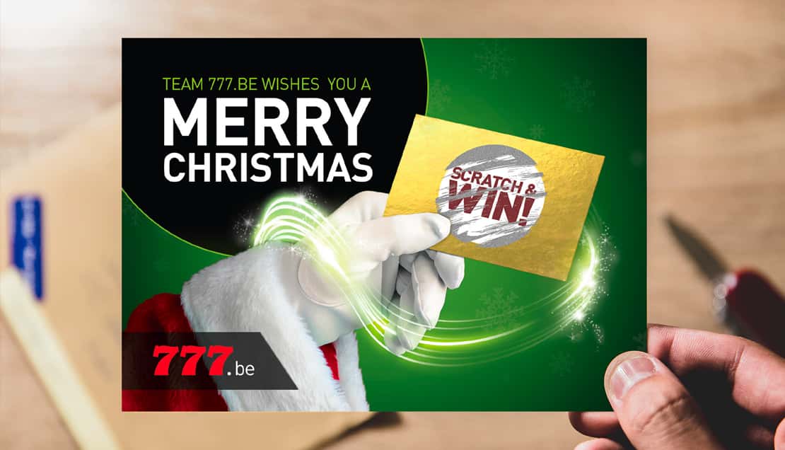 Green Merry Christmas card with a gloved hand holding a gold scratch-and-win card.